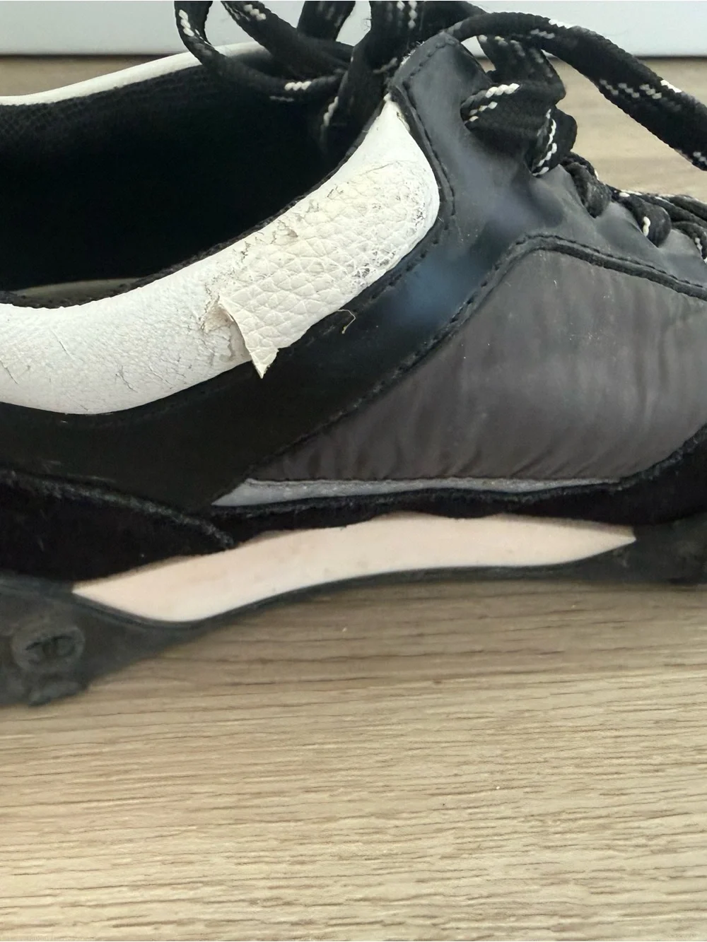 CHANEL Black and White Men’s Logo Running Sneakers